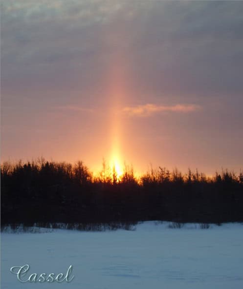 Watermark added to a photo with blend mode change depending on the color of the photo